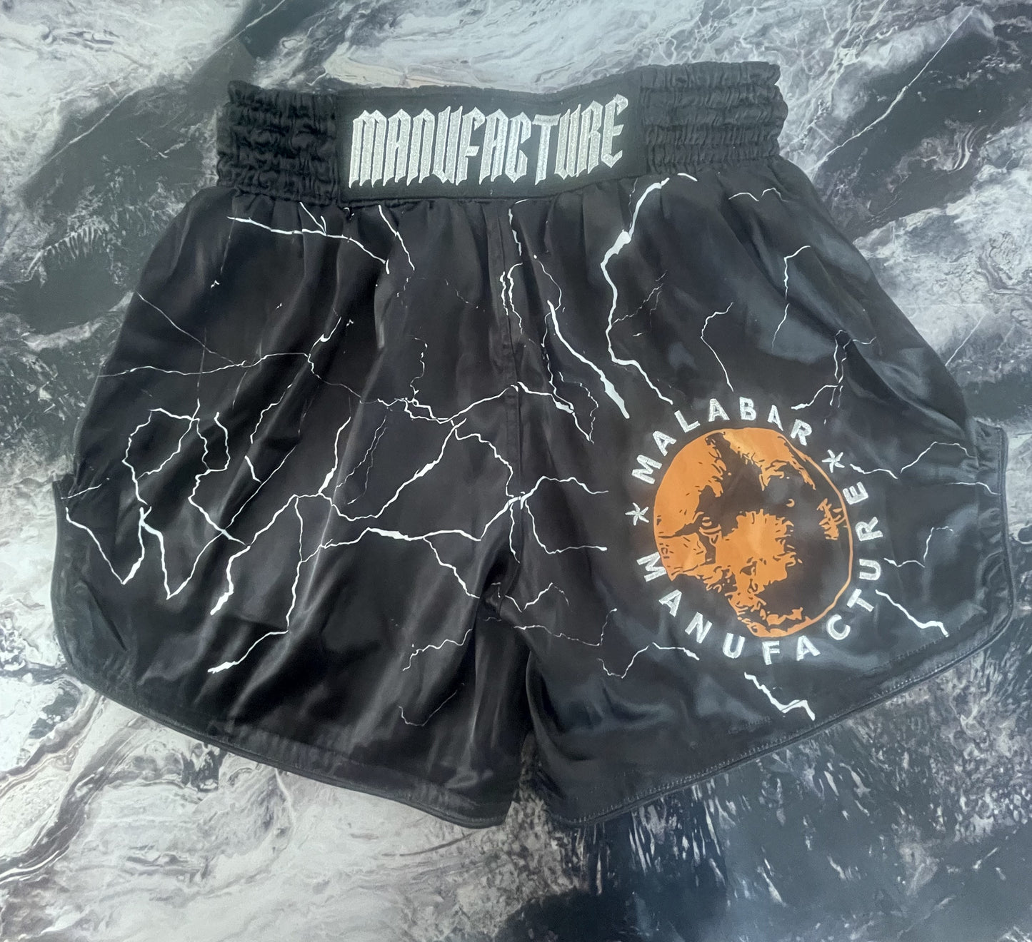 Short boxe Muay-Thaï